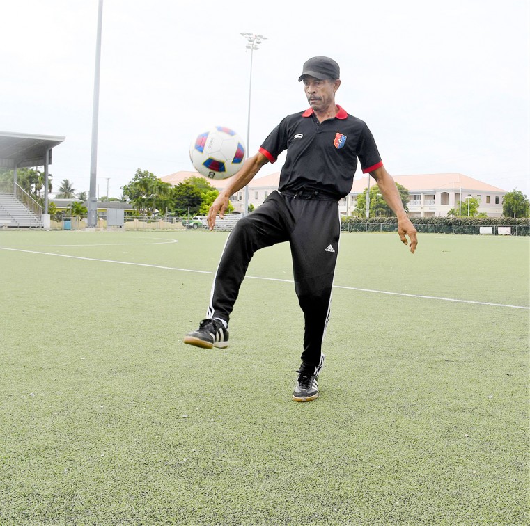 Coach Ernie ‘Gillie’ Edison Seymour, GGM juggles at The Annex, George Town.