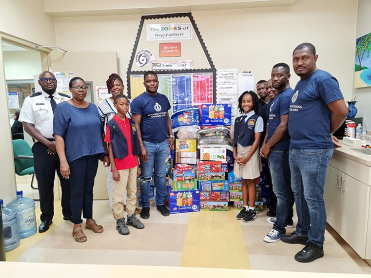 HMCIPS Football Club presented to Theoline L. McCoy Primary School in May 2021 with donations gathered for their Snack Drive.