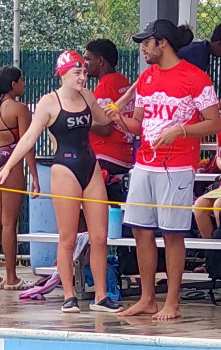 Standout local swimmer returns to coach at Stingray Swim Club this summer