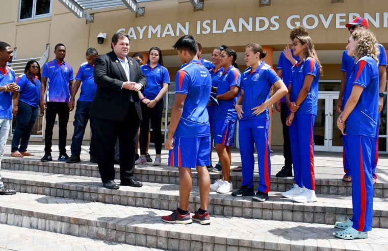 Premier, Hon. Wayne Panton gives words of encouragement to Team Cayman athletes on the steps of the Government Administration Building, Friday, 22 July 2022. The national delegation heads off to Birmi