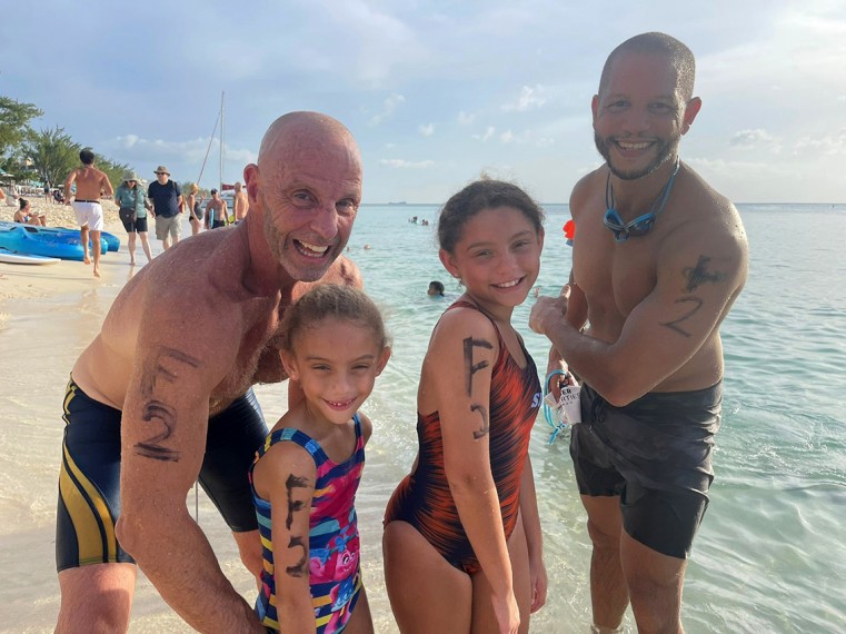 Cayman’s open water relay race returns to Seven Mile Beach