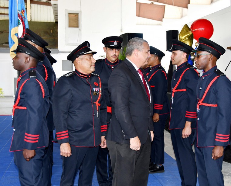 Deputy Governor, Hon. Franz Manderson reviewing the CIFS Class of 2022 Fire Fighters. He is joined by Chief Fire Officer Randy Rankin and Firefighter Luke Welds.