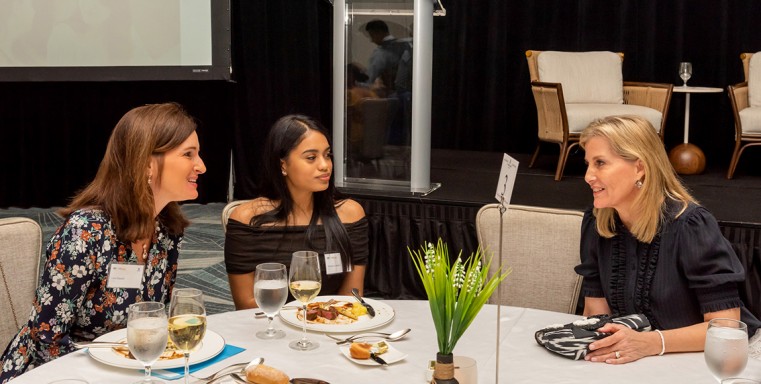HRH The Countess of Wessex and 100WF Cayman member Ms. Lara Deysel in conversation with one of the 100WF GirlForce100 mentees. HRH The Countess of Wessex and 100WF Cayman member Ms. Lara Deysel in conversation with one of the 100WF GirlForce100 mentees.