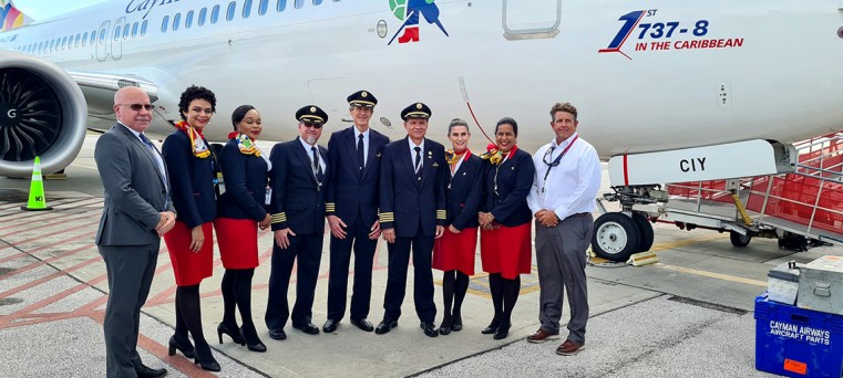 Kel with Cayman Airways staff