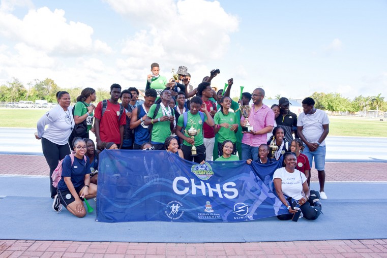 Representatives of Clifton Hunter High School are jubilant after collecting the winning trophy.
