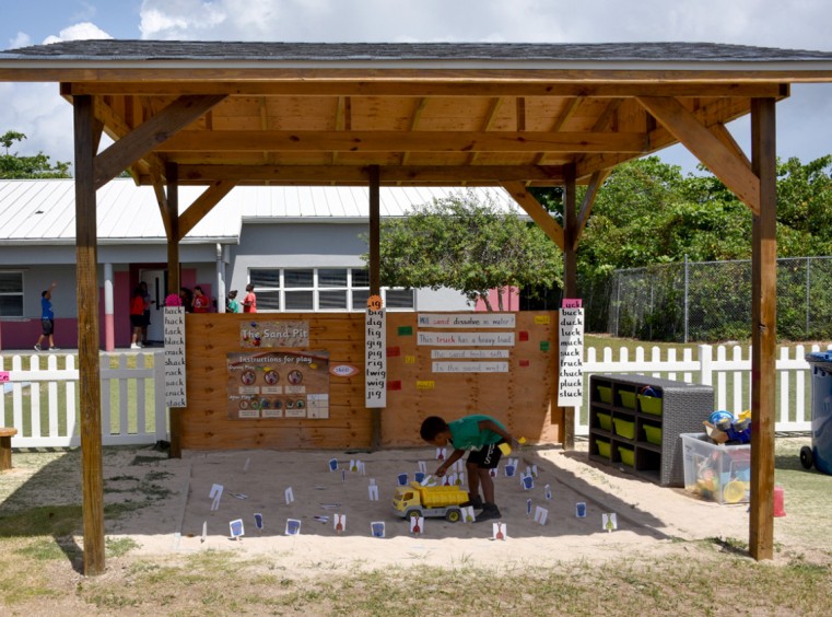 A Red Bay student enjoys the new Outdoor Reception Area.