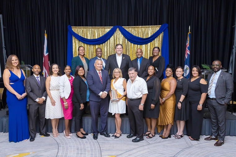 2022 Employees of the Month pose with Premier Hon. Wayne Panton, Chief Officers (at rear) and the Deputy Governor Hon. Franz Manderson (front, 6th left).