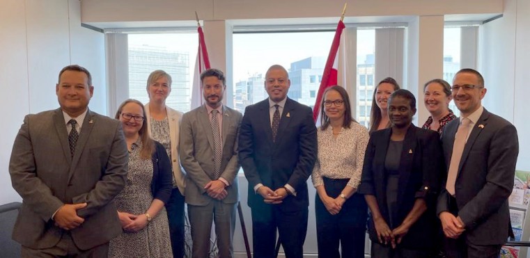 Minister of Financial Services and Commerce, the Hon. André Ebanks (centre); with Government’s Financial Services Representative, Mr Gene DaCosta (left); Senior Legislative Advisor to the Department f