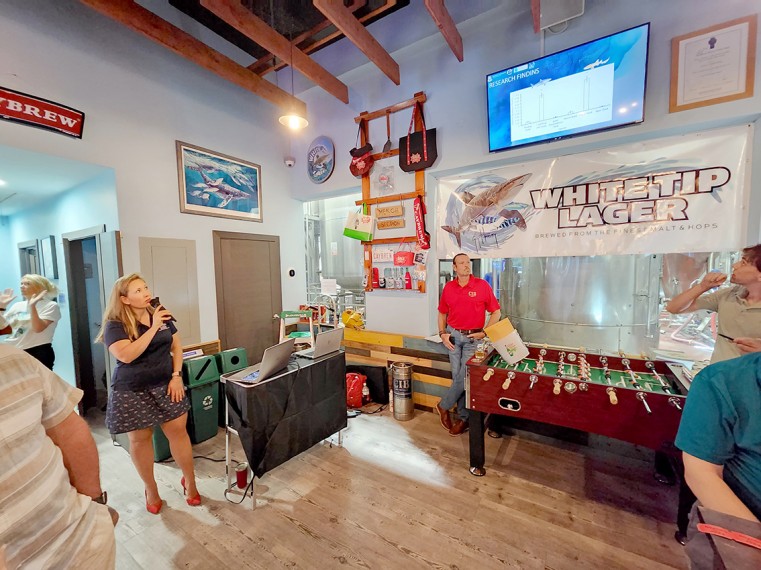 Shark Project Officer, Dr. Johanna Kohler talks to an audience about the shark research and conservation at a special event held at the Caybrew ‘Tap Room’ on 11th July, 2023.