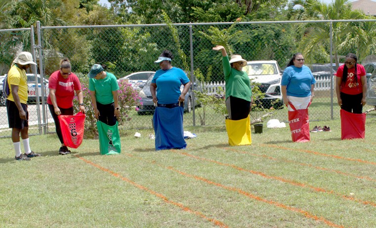 Staff and stakeholders taking part in one of the many fun races throughout the day