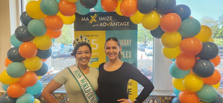 (l-r) Miss World Cayman Leanni Tibbetts, stands with Miss Universe Cayman Mariah Tibbets at the launch of the Hurley’s Max reward programme on October 5th.
