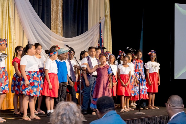 The George Town Primary School Choir enchants the audience with a captivating cultural performance at the 25 Most Outstanding Women Listeners in the World 2023 Gala.