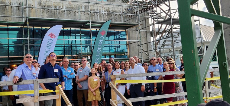 Cayman’s business community, along with government officials gathered for the ‘topping out’ celebration of Phase 7 of Pavilion East at the Cricket Square in George Town on Thursday, 14th March.