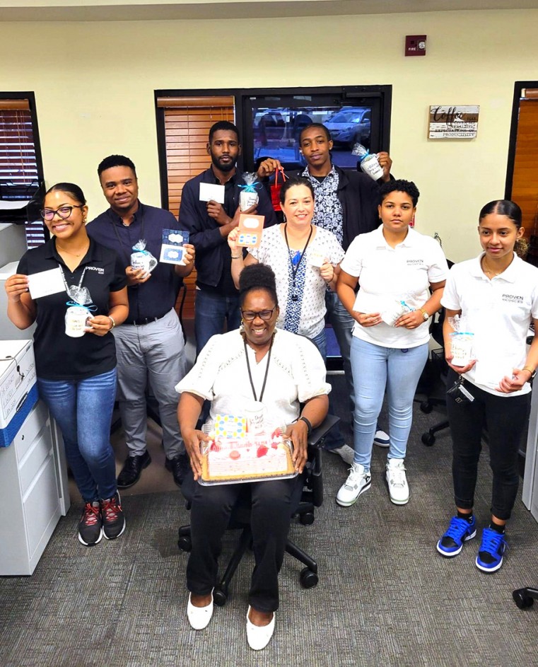 PROVEN Bank from l-r standing: Sommer Thompson, Joshua Bent, Danner Taylor, Nora Bonilla-Flores, Ralston Ebanks, Jovanna Ebanks, Ethana Villalobos. Sitting: Dezeta Ebanks