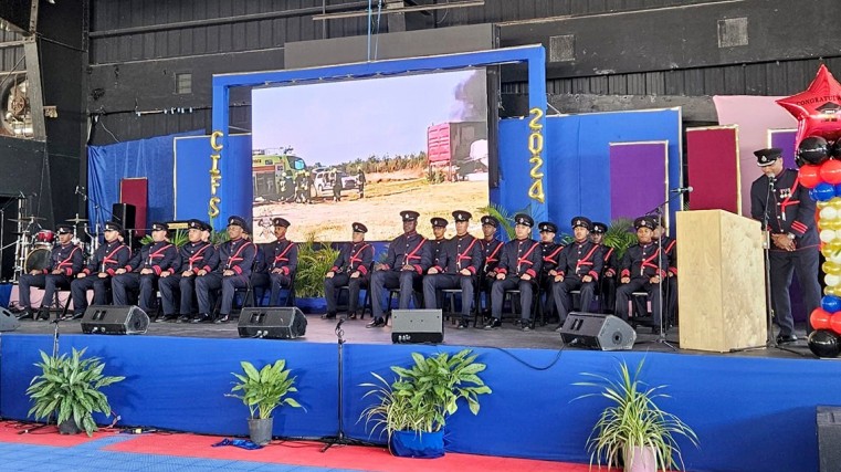 The new firefighters listen attentively during their passing out ceremony held at the Lions Community Centre on 25 April.