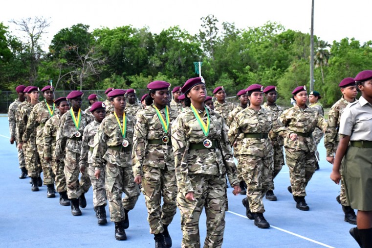 The cadets march off the parade during the Cayman Islands Cadet Corps passing out ceremony held at the Truman Bodden Sports Complex recently.