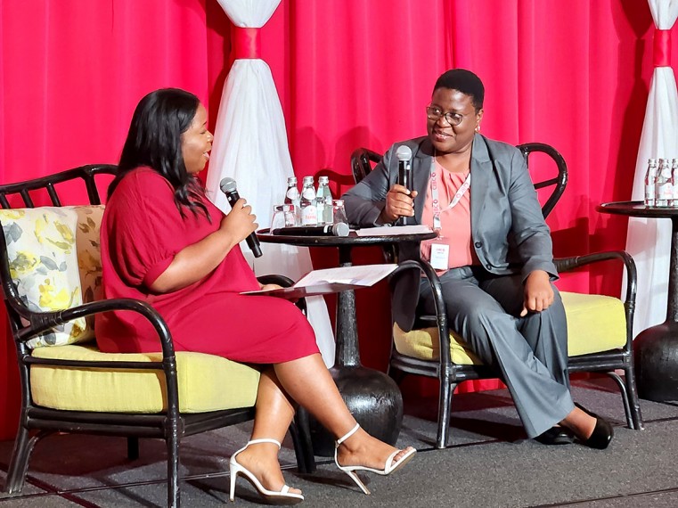 MC Shanda Gallego interviews a CIBC representative during the Bank’s Leadership Conference for entrepreneurs at the Kimpton Seafire Resort in the Grand Cayman on 25th June, 2024.