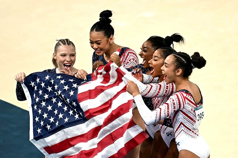 Biles celebrates Olympic gold with teammates