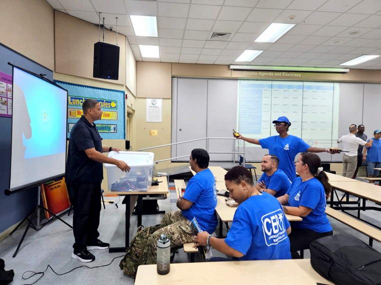 HMCI Manager for Logistics and Operations, Leslie Vernon showing CERT members necessary tools and supplies.