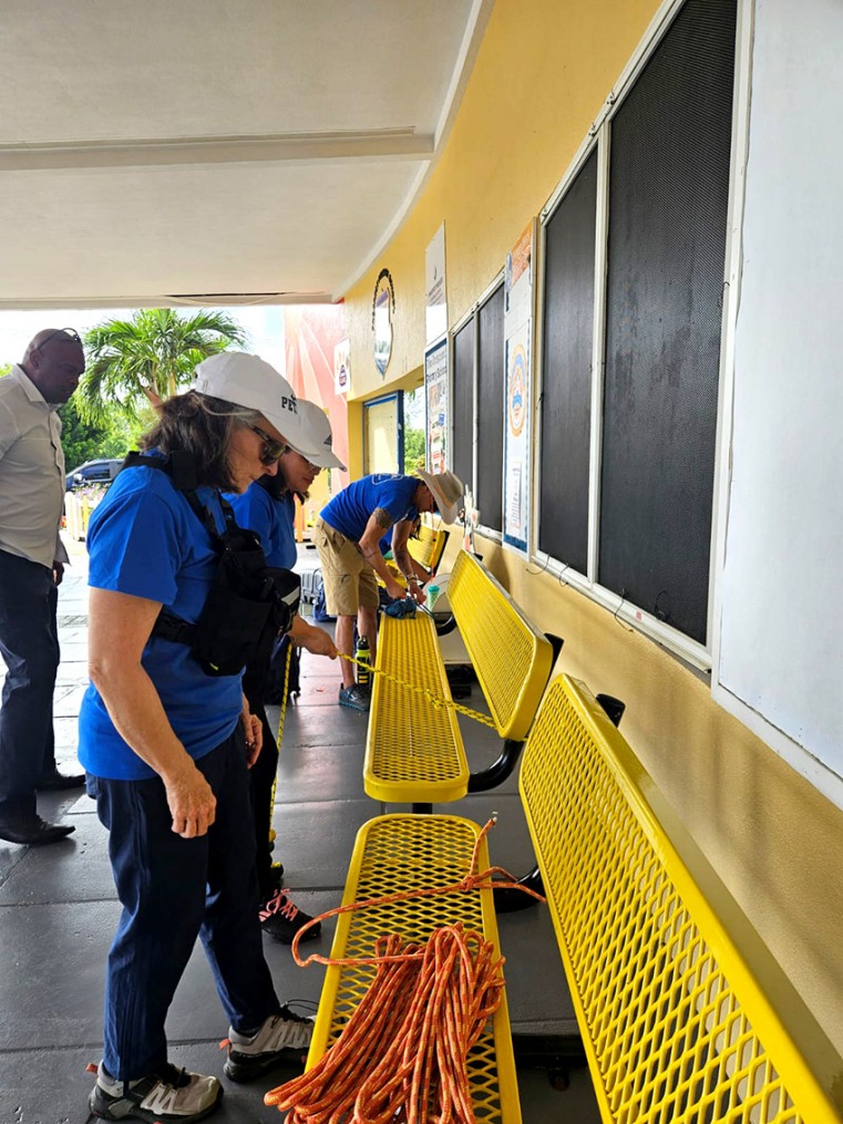 CERT members practicing their rope work with a member of the Cayman Islands Fire Service.