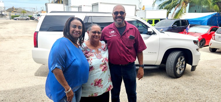 (L-R) Mrs. Denise Mecado stands with Cayman Islands Premier, the Honourable Juilanna O’Connor Connolly and Mr. Marc Mecado at the recent graduation of the sixth cohort of the Superior Auto Training Pr