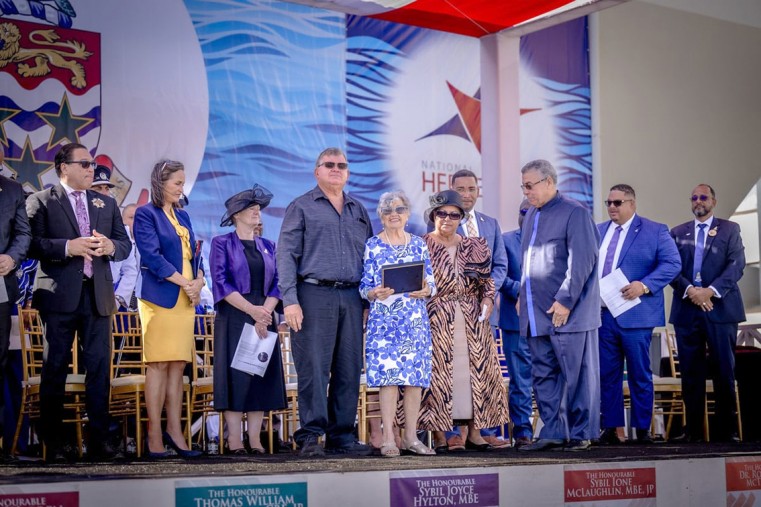 Hon. Francine Jackson, CMM (centre) accepts her title as a National Hero during the 2025 National Heroes Day Award Presentation