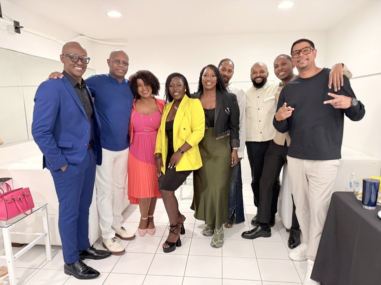 Cast members (L-to-R) Benny Pough, Patrice Beersingh, Jawara Alleyne, and John Watler on set, discussing strategies for breaking barriers in the global creative industry.