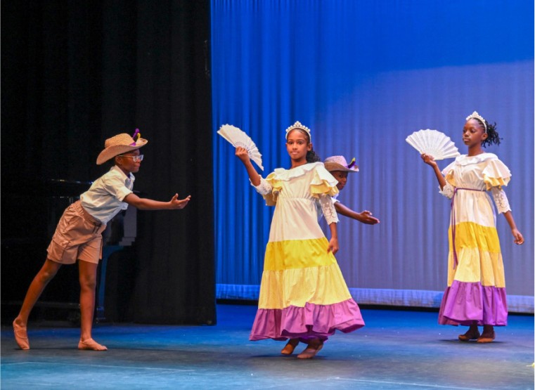 Theoline McCoy Primary students dazzle with a traditional maypole dance.